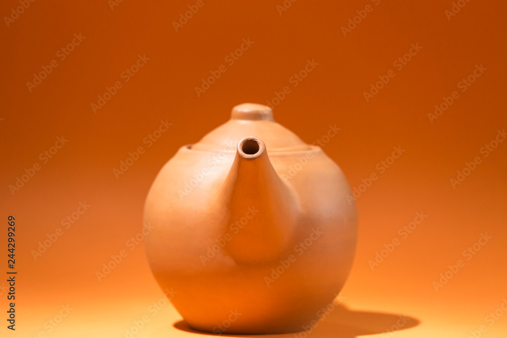 teapot on orange teapot on orange