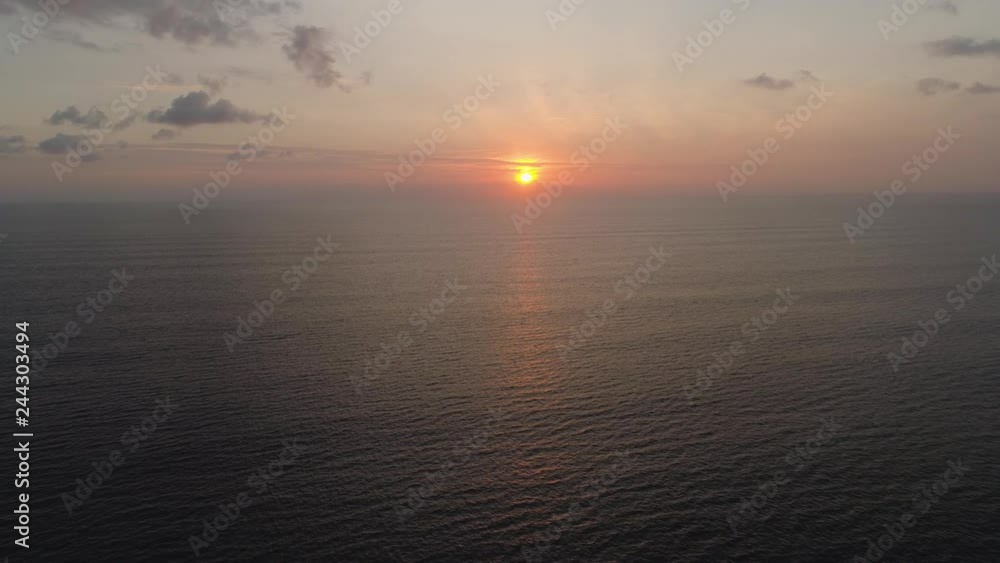 aerial view sunset over ocean. seascape. colorful sunset over sea in tropics. Flying over surface sea at sunset. aerial seascape ocean surface. Travel concept aerial view sunset over ocean. seascape. colorful sunset over sea in tropics. Flying over surface sea at sunset. aerial seascape ocean surface. Travel concept