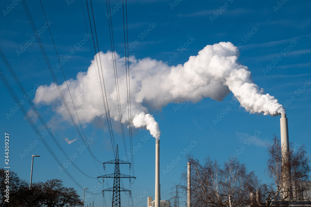 white smoke coming out a power plant / factory white smoke coming out a power plant / factory