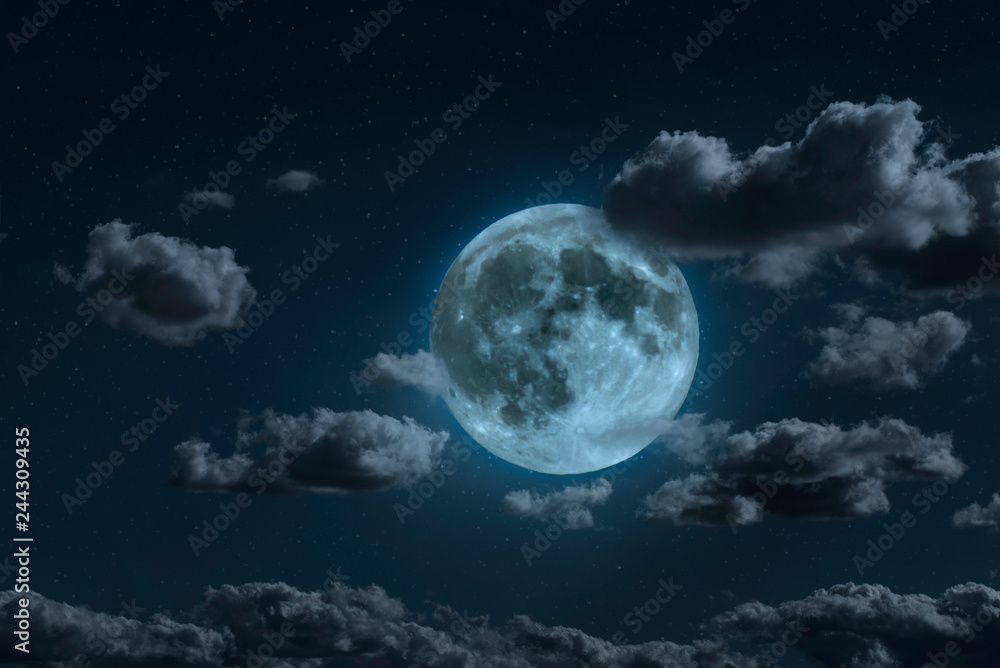Moon and clouds in the night. Moonlight background.