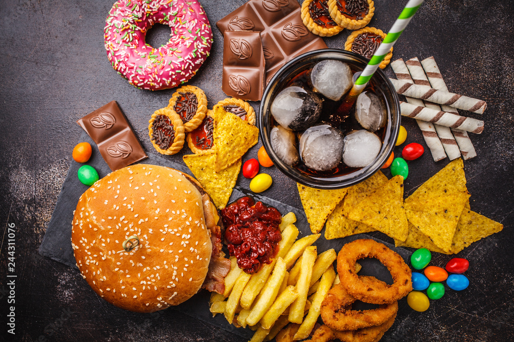 Junk food concept. Unhealthy food background. Fast food and sugar ...