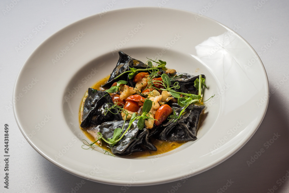 Black ravioli with cod and shrimp Black ravioli with cod and shrimp