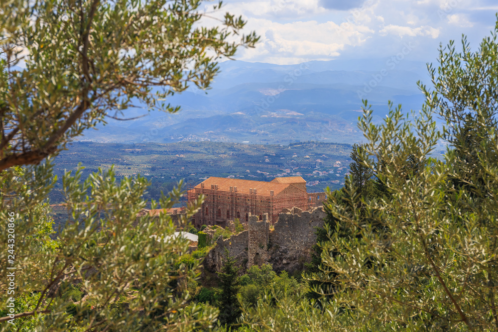 distant view on Paleolog castle in Mystras against Laconia valley