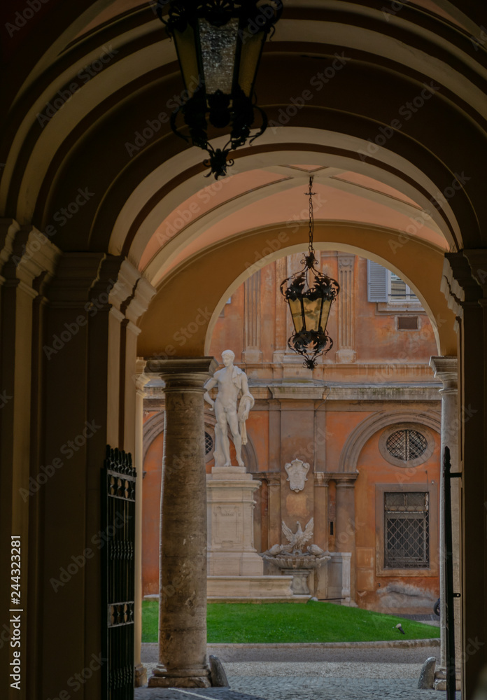 marble statue in courtyard of musei capitolini in historical center of Rome, Italy