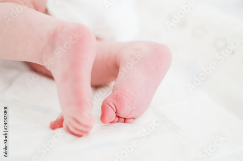 Newborn baby feet and fingers