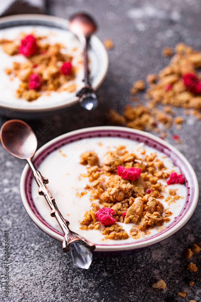 Granola with yogurt and dried raspberries Granola with yogurt and dried raspberries