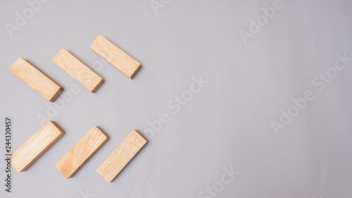 Wood block stacking.Business concept on gray background