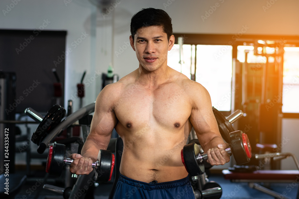 Close Up Men in Gymnasium Exercise Concepts for Body Health Whit copy space Close Up Men in Gymnasium Exercise Concepts for Body Health Whit copy space