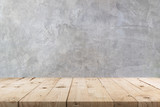 Empty wooden table and concrete wall texture and background with copy space, display montage for product.