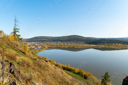 Beautiful view from the mountain to the outskirts of the city. Near a small lake and forest. Fresh air.