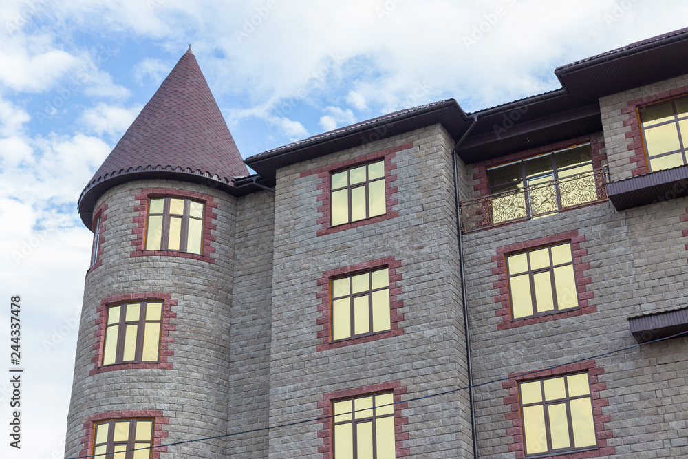 Manor Tower on a background of blue sky Manor Tower on a background of blue sky