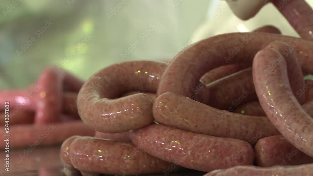 Sausage production. Meat and fat are ground in a special machine. The resulting stuffing is sent to the productive workshop. Special machines cook sausages. The finished product is sent to the dryer. Sausage production. Meat and fat are ground in a special machine. The resulting stuffing is sent to the productive workshop. Special machines cook sausages. The finished product is sent to the dryer.