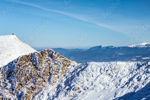 Winter snowy landscape at mountain during a sunny day with blue sky. The Mala Fatra national park in Slovakia  Europe.