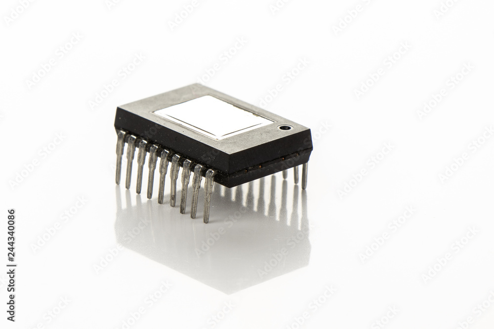 Microchip with eighteenth legs on a white background Microchip with eighteenth legs on a white background
