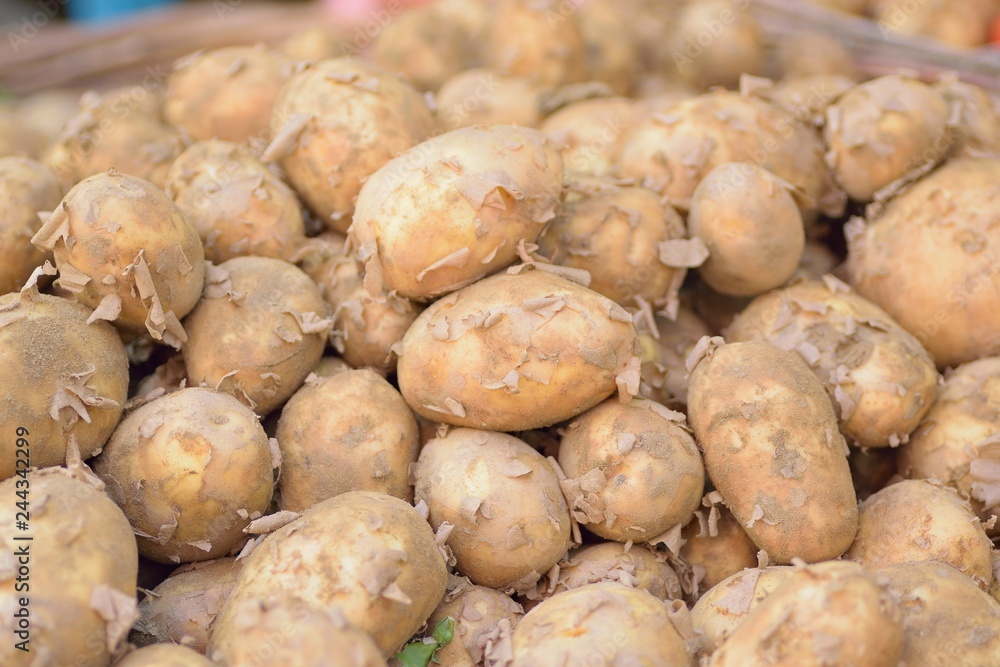 Macro details of Fresh Potatoes at street side vegetable market in India Macro details of Fresh Potatoes at street side vegetable market in India