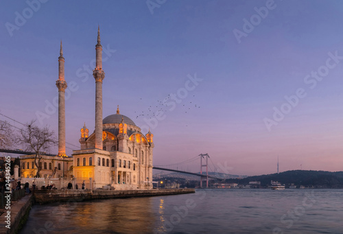 Ortakoy Mosque with Bosphorus Bridge in Istanbul during the sunset.