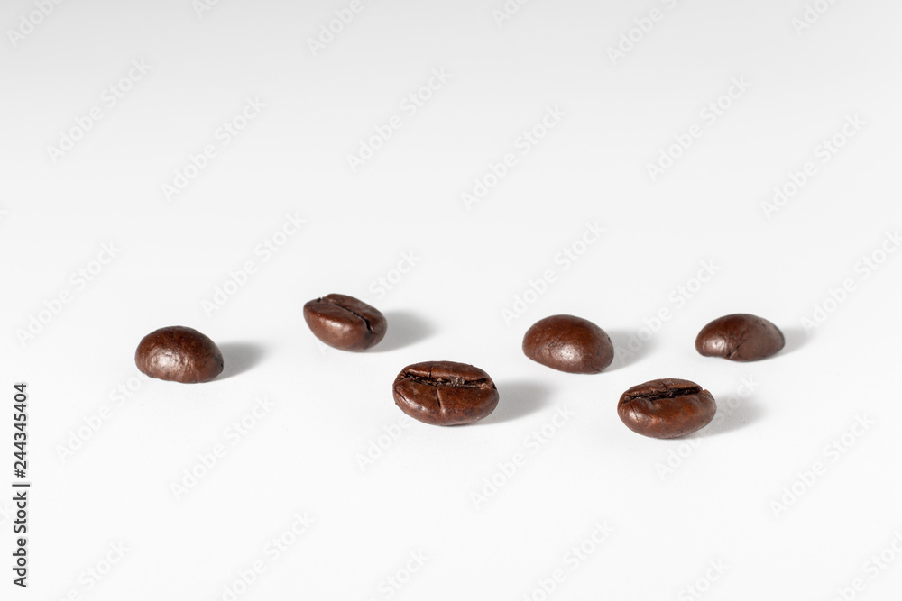 Naklejka premium coffee beans on white background