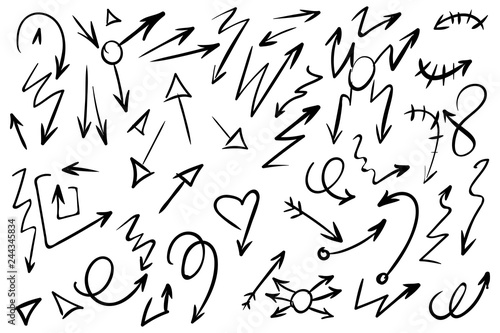 Arrow doodles vector. A set of simple sketches of arrows. Up  down  left  right ones. The effect of a pencil sketch isolated on white background. Vector eps 10.