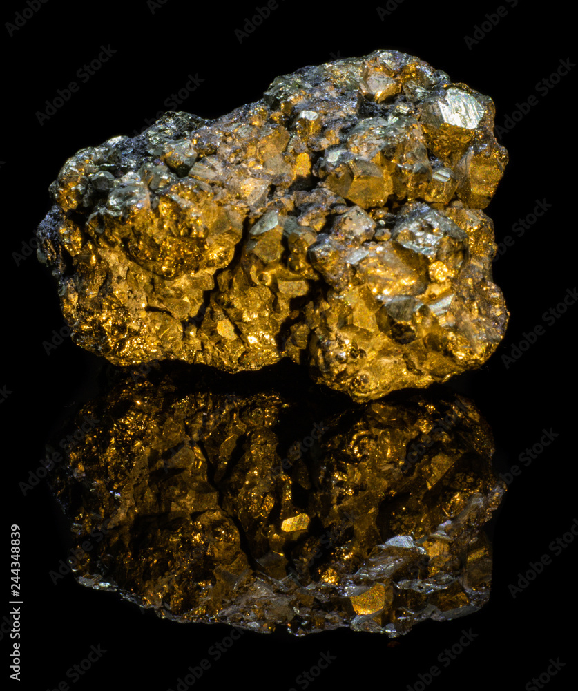 Small natural druse of pyrite on a black background with reflection Small natural druse of pyrite on a black background with reflection