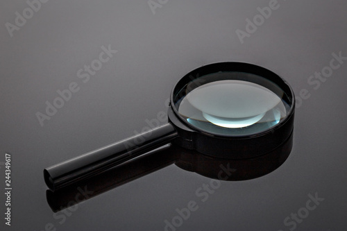 Old magnifying glass photo