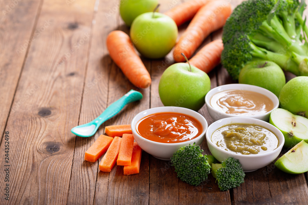 Baby food. Various bowls of fruit and vegetable puree Baby food. Various bowls of fruit and vegetable puree