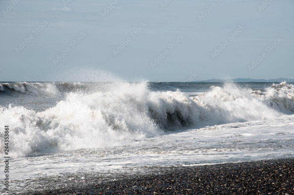 waves crashing on the beach