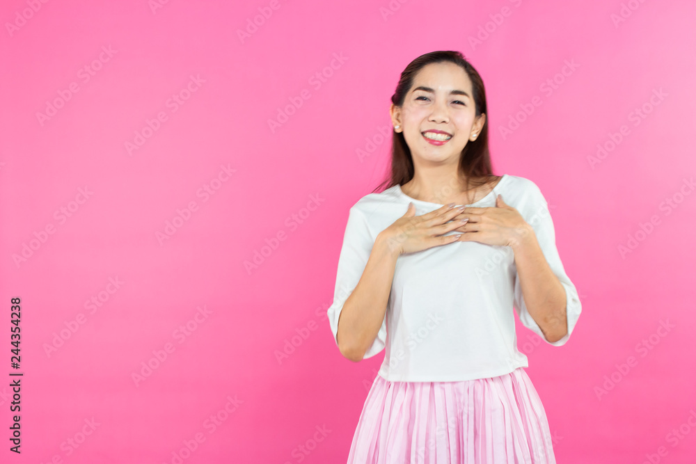 valentine day concept. Beautiful smiley asia girl with pink background copy space isolated. valentine day concept. Beautiful smiley asia girl with pink background copy space isolated.