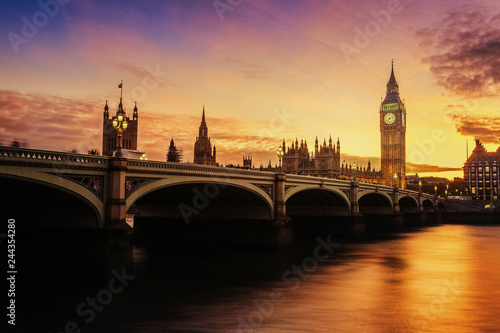 Dramatic sunset over famous Big Ben clock tower in London, UK. © fenlio