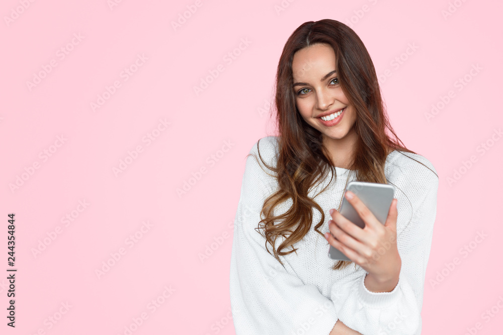 Smiling teen girl with smartphone Smiling teen girl with smartphone