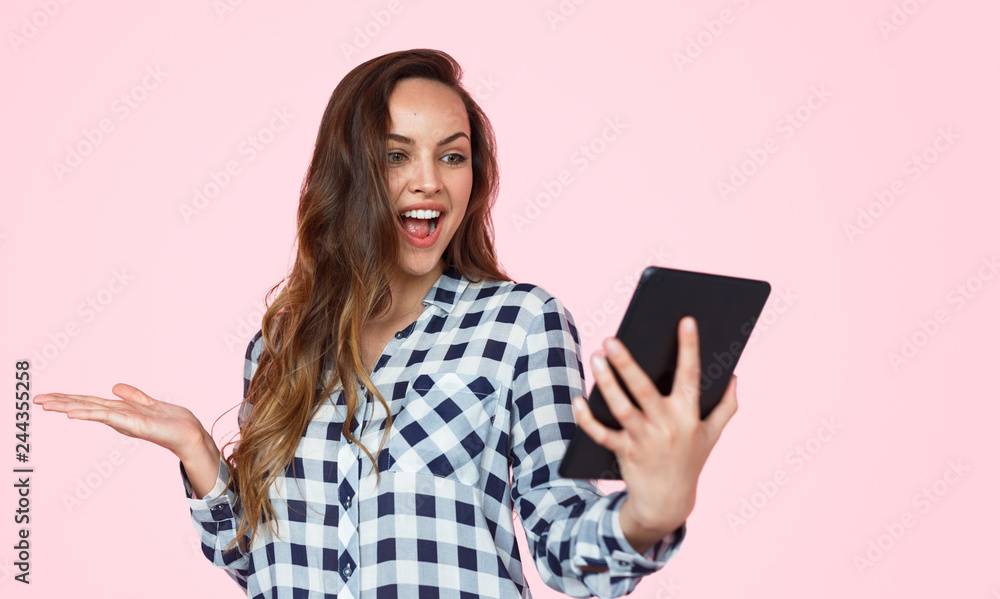 Smiling woman chatting via tablet Smiling woman chatting via tablet