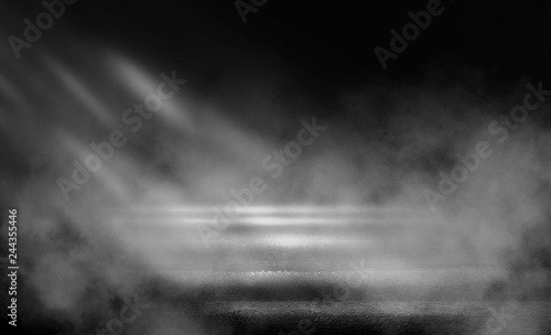Black background of empty street, room, spotlight illuminates asphalt, smoke