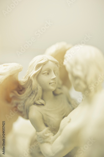 couple of angels archangel in romantic embrace like love, peace, guardin angel and religion concept photo