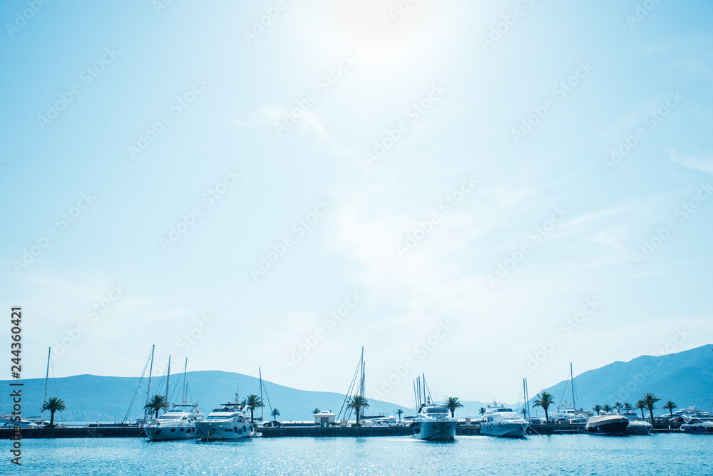 yachts in montenegro bay. mountains on background yachts in montenegro bay. mountains on background
