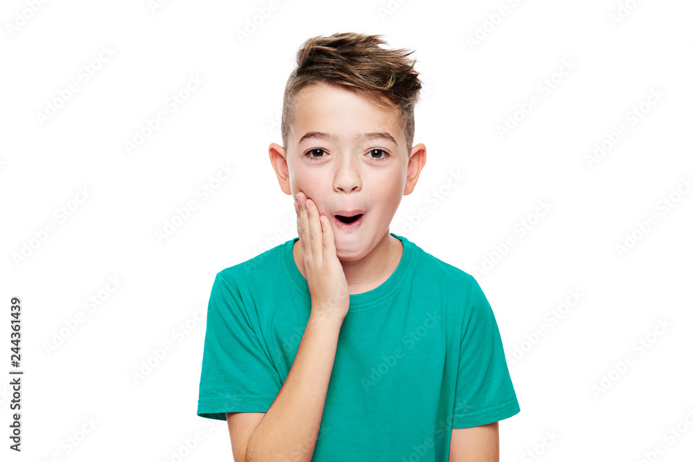 Adorable young boy in shock, isolated over white background. Shocked child looking at camera in disbelief. Shock, amazement, surprise concept. Adorable young boy in shock, isolated over white background. Shocked child looking at camera in disbelief. Shock, amazement, surprise concept.