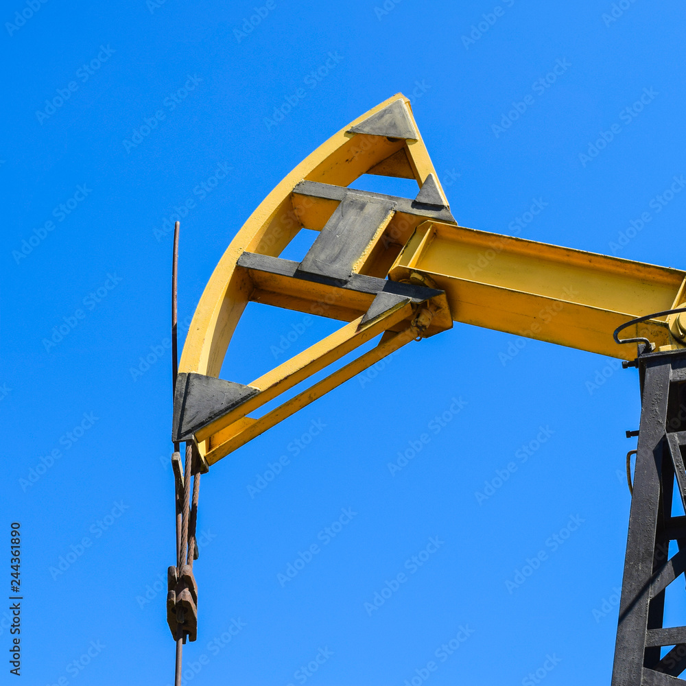 Fototapeta premium Pumping unit as the oil pump installed on a well