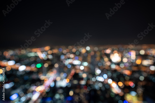 Bokeh of Bangkok street light from skyscraper / blur background / bokeh concept / festive background / nightlife