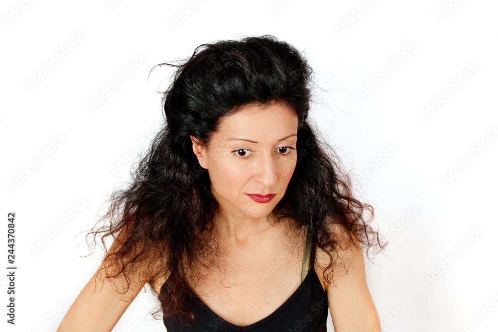 Fototapeta premium Disheveled attractive young woman on white background