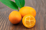 Kumquat fruits on wooden