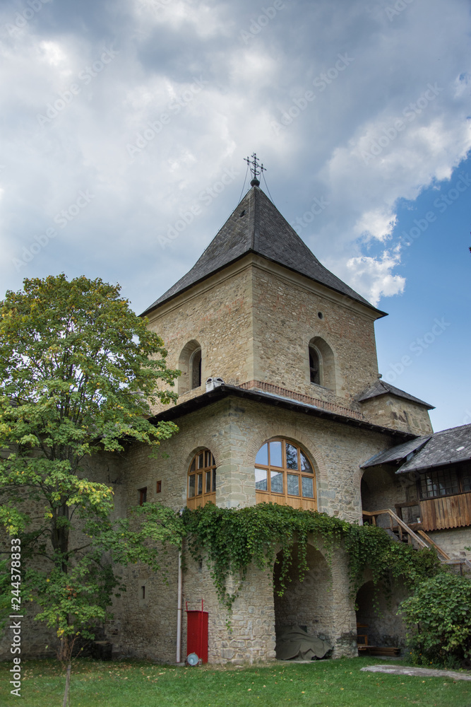 Naklejka premium Vatra Moldovitei, Romania, Moldovita Monastery,September ,2017,inner yard,defensive wall