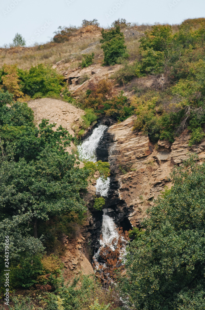 Mountain river waterfall landscape. Waterfall river scene