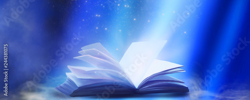 An open book with a magical fantasy. Night view illustration with a book. The magical power of reading and words, knowledge. Abstract background with a book.