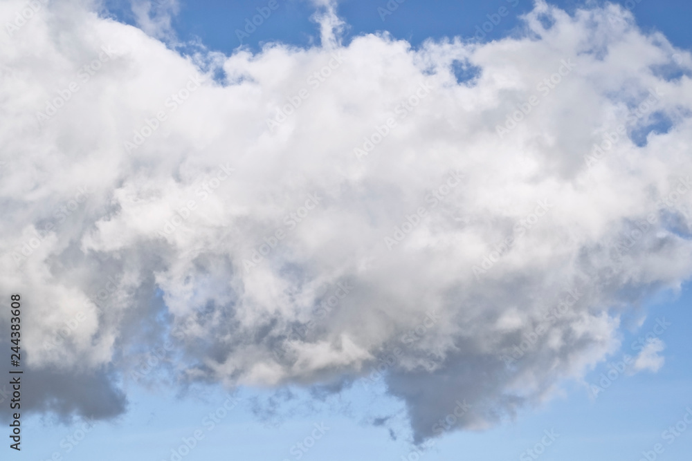 Ragged Cumulus cloud in blue sky Ragged Cumulus cloud in blue sky