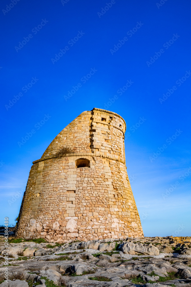 The ancient watch tower of Porto Miggiano, built on the cliffs overlooking the sea. Bleak and rocky landscape with a splendid view of the sea. Santa Cesarea Terme, Puglia, Salento, Italy. The ancient watch tower of Porto Miggiano, built on the cliffs overlooking the sea. Bleak and rocky landscape with a splendid view of the sea. Santa Cesarea Terme, Puglia, Salento, Italy.