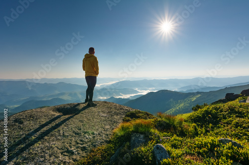 Motivating image of a man in the mountains.