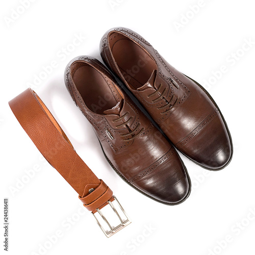 Men's classic brown leather shoes isolated on white background. Top view