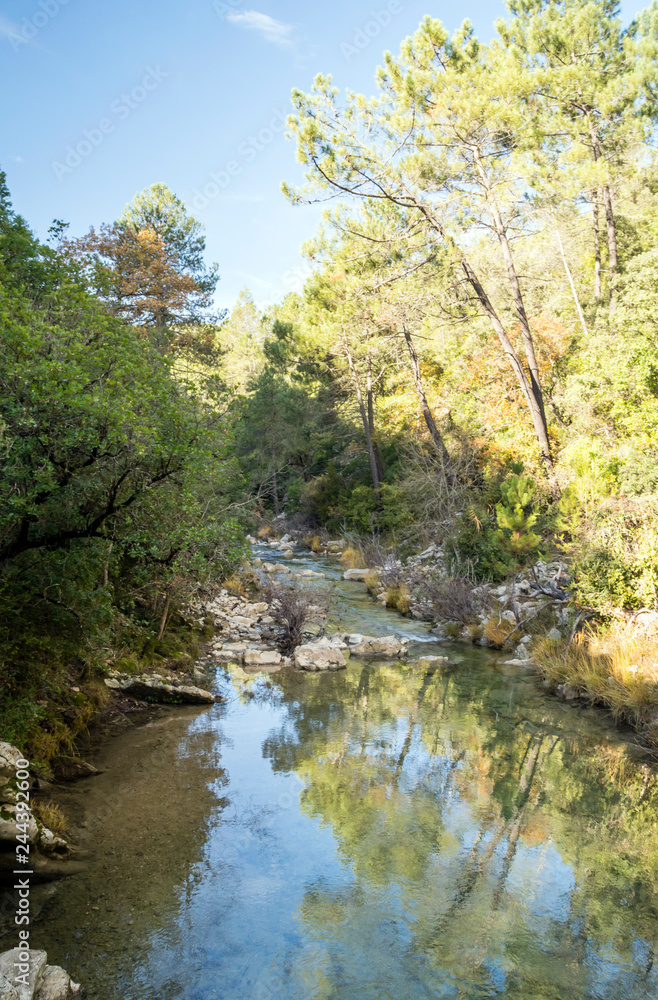 Beginning of the Guadalquivir river in the Sierra de Cazorla in the Spanish province of Jaen on a sunny day. Beginning of the Guadalquivir river in the Sierra de Cazorla in the Spanish province of Jaen on a sunny day.