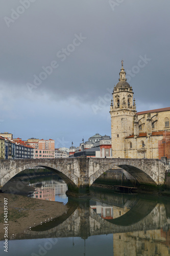 San Anton church and the Ribera market, in the old town of Bilbao, Basque Country, Spain. On a cloudy day.