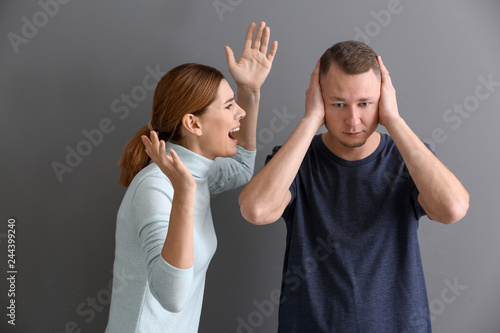 Unhappy couple having argum...