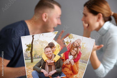 Unhappy couple with torn ph...