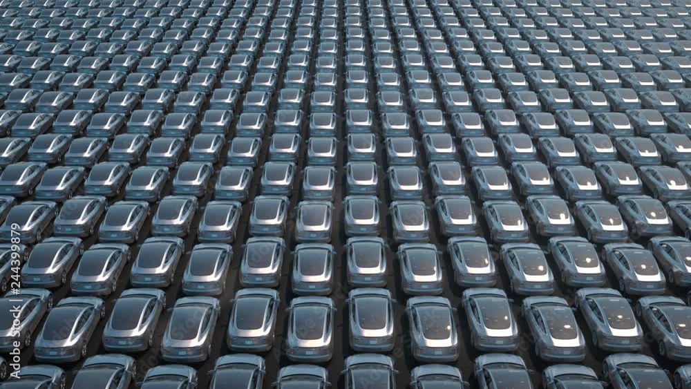 Electric cars waiting to be shipped aerial view of big parking lot depicting less demand during recession 3d rendering Electric cars waiting to be shipped aerial view of big parking lot depicting less demand during recession 3d rendering